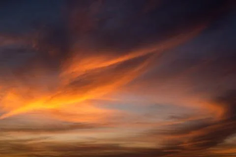 Texture of bright evening sky during sunset. Stock Photos