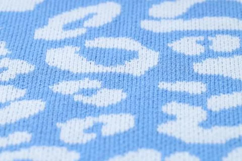 Texture of bright knitted fabric with pattern as background, closeup Foto stock