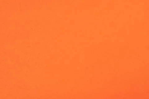 Texture of bright orange paper as background Stock Photos
