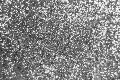 Texture bright silver glitter for design, sparkles,  blur Stock Photos
