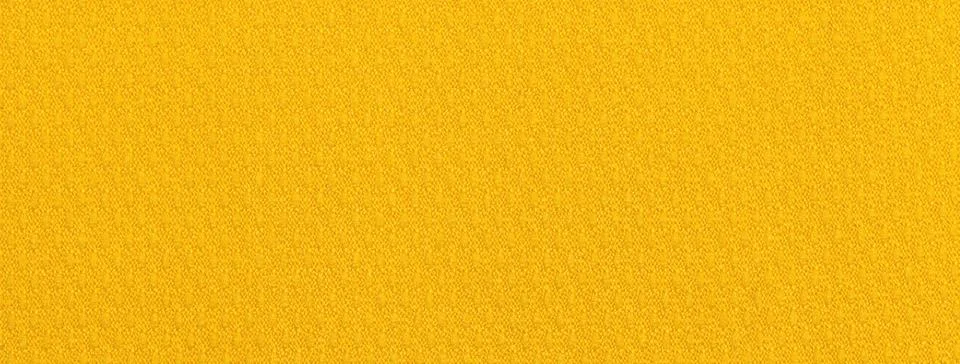 Texture of bright yellow background from textile material with wicker pattern Stock Photos