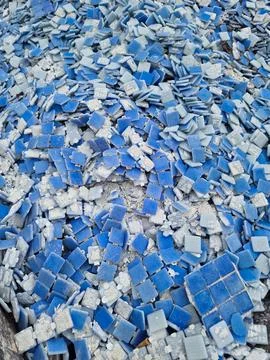 Texture of broken blue ceramic tiles Stock Photos