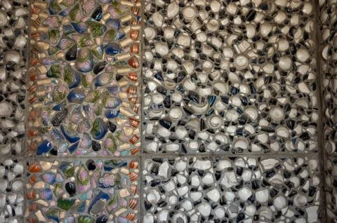 Texture of broken dishes on the wall Stock Photos
