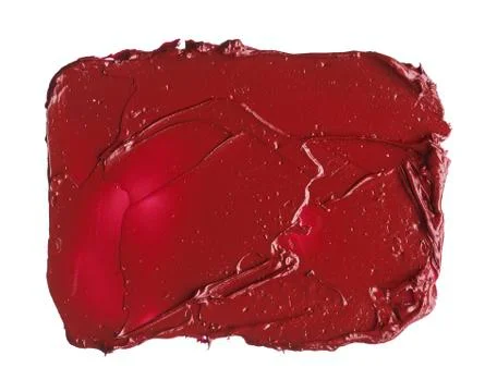 Texture of broken red lipstick Stock Photos