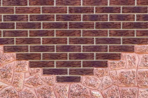Texture of a  brown brick wall background Stock Photos
