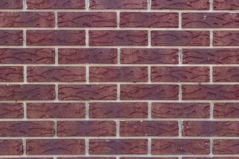 Texture of a  brown brick wall background Stock Photos