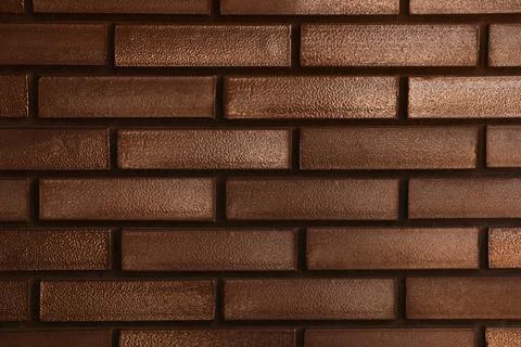 Texture of brown brick wall as background Stock Photos