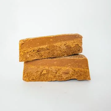 Texture brown cheese, close up Stock Photos