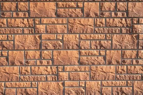 Texture of brown decorative facade brick Foto stock