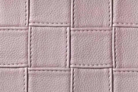 Texture of brown leather background with square pattern and stitch, macro. Foto stock
