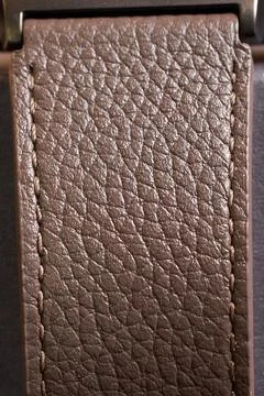 The texture of a brown leather watch strap. Close-up Stock Photos