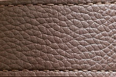 The texture of a brown leather watch strap. Close-up Stock Photos