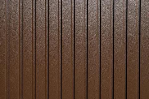 Texture of brown metal profiled sheet fence decking. Texture pattern for 스톡 사진