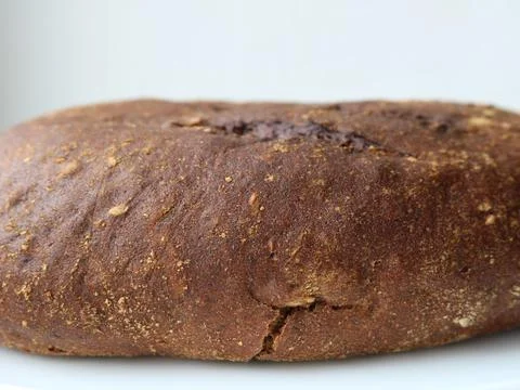 Texture of brown rye bun crust Stock Photos