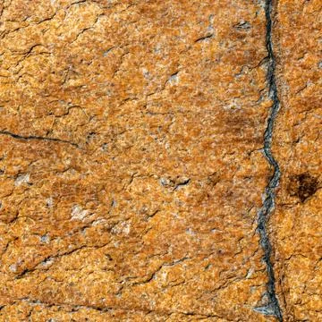 Texture of brown stone or marble with vertical and horizontal cracks Stock Photos