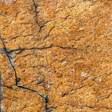 Texture of brown stone or marble with vertical and horizontal cracks Stock Photos