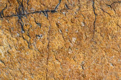 Texture of brown stone or marble with vertical and horizontal cracks Stock Photos