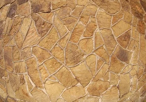 The texture of brown stone wall Stock Photos