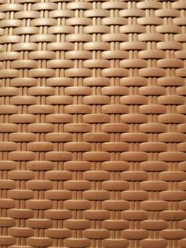 The Texture of Brown woven pattern with sunlight Stock Photos