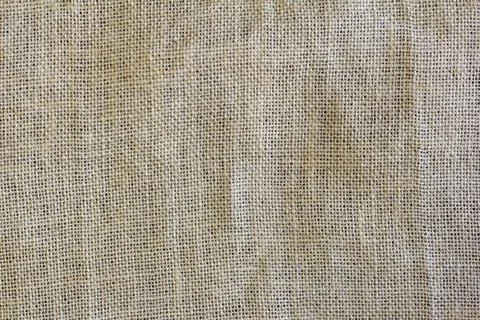 The texture of the burlap. The background is made of a very coarse fabric, wo Stock Photos