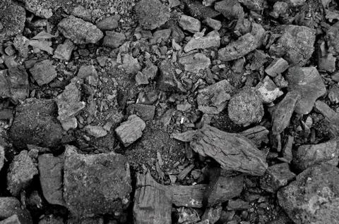 Texture of burnt coal in a fire. gray-black background Stock Photos