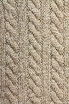 The texture of a camel wool sweater Stock Photos