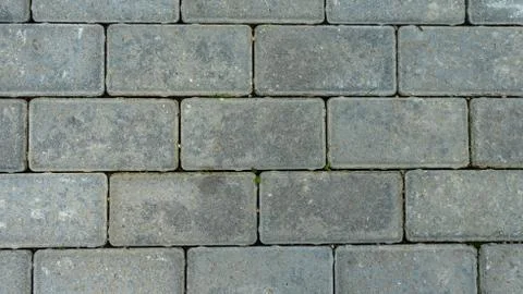 The texture of cement floor tiles. Rough surface with particles of sand and Stock Photos