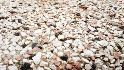 Texture of cemented small gray grey stones gravel for background or backdrop Stock Footage 205495839