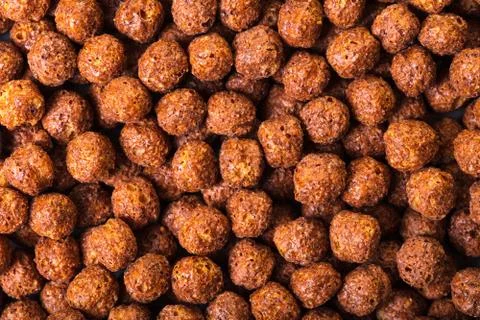 Texture of cereal balls with cocoa Stock Photos