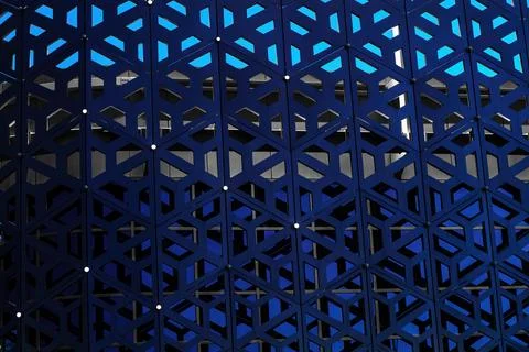 The texture of the cladding of a building made of metal aluminum panels wit.. Fotos de archivo