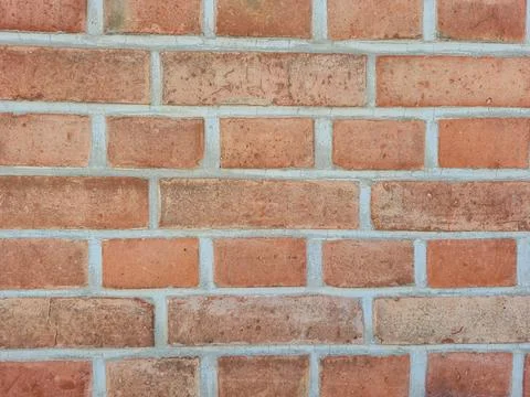 This is the texture of a Classic Red Brick Wall showcasing intricate detail.. Stock Photos
