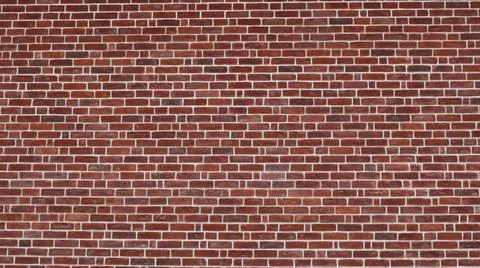 Texture of a classic red brick wall with white mortar joints Stock Photos