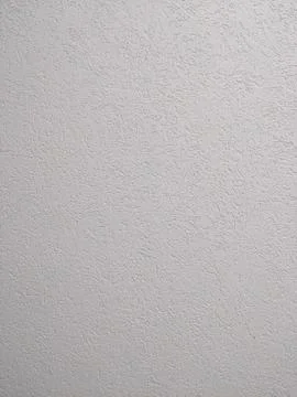 Texture of clean cement plaster with pattern on a white wall, for background Stock Photos