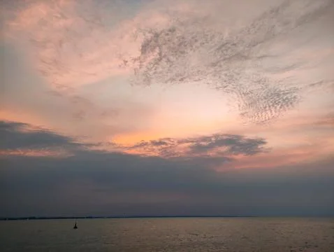 The texture of the clouds is colorful reddish orange in the afternoon Stock Photos