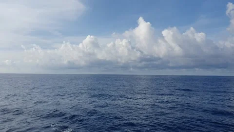 Texture of clouds in the sky over a choppy ocean Stock Footage 297647417