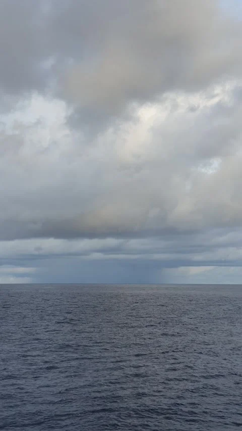 Texture of clouds in the sky over a choppy ocean Stock Footage 297674568