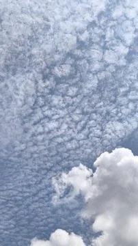 Texture of cloudy gray clouds with varying white clouds Stock Photos