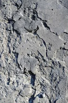 The texture of coarse plaster. The old wall. Cracked wall and texture of ceme Stock-Fotos