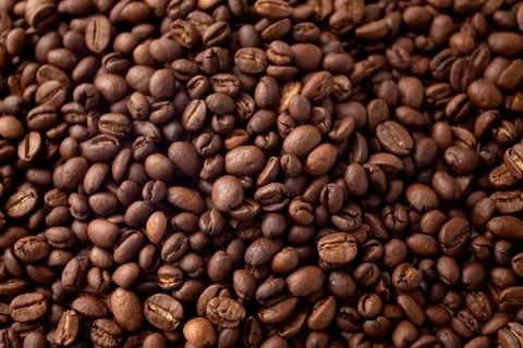 Texture of coffee beans. Coffee beans background. Roasted coffee full frame Stock-Fotos