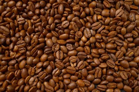 Texture of coffee beans. Roasted coffee beans background. close up Coffee bea Stock Photos