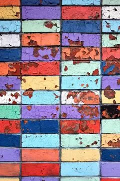 Texture of colored aged peeling tiles - background Stock Photos