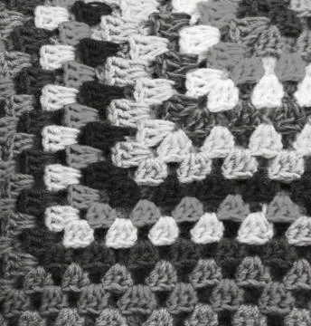Texture of colored knitted fabric Stock Photos