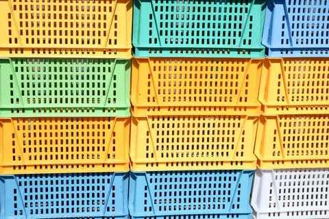 Texture from colored plastic colored yellow blue green rectangular boxes with 스톡 사진