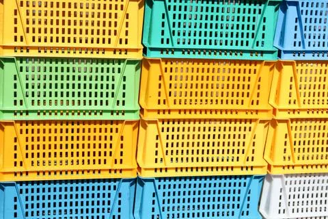 Texture from colored plastic colored yellow blue green rectangular boxes with Stock Photos