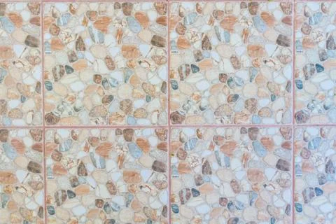 The texture of the colored stone in the form of tiles on the street Stock Photos
