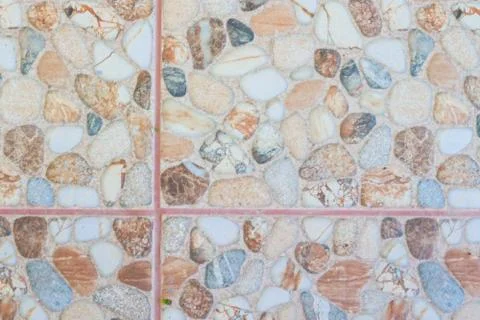 The texture of the colored stone in the form of tiles on the street Stock Photos