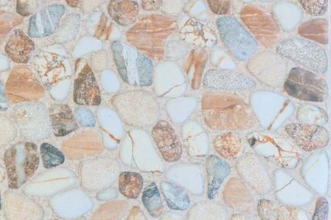 The texture of the colored stone in the form of tiles on the street Stock Photos