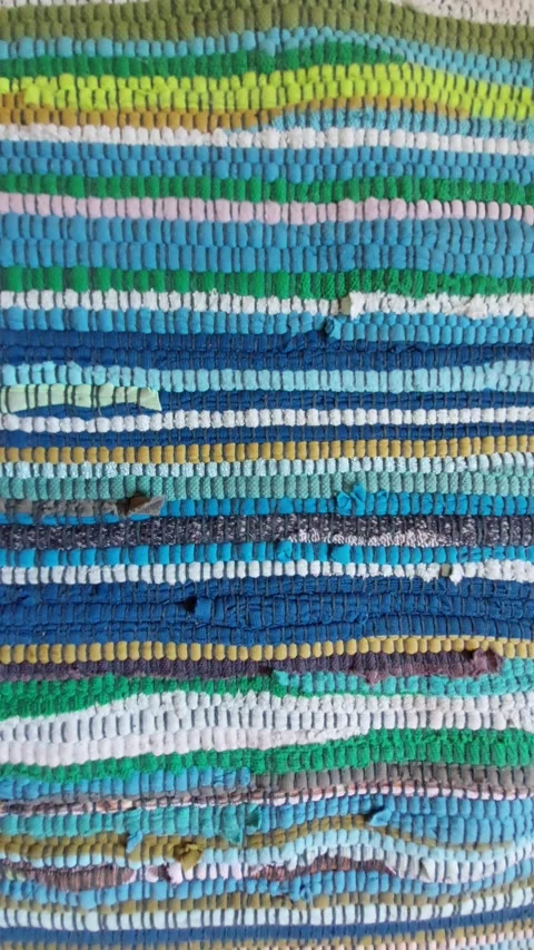 Texture of a colorful handmade woven rag rug Vídeo Stock 334333058