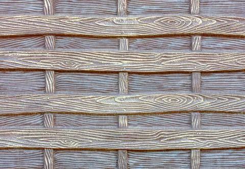 The texture of the concrete wall under the stylization of a wooden fence with Fotos de archivo