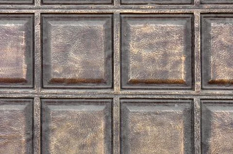 The texture of the concrete wall under the stylization of bronze metal square Foto stock